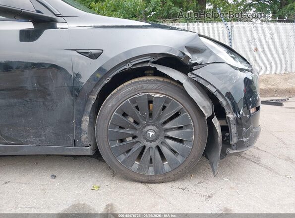 7SAYGAEE2NF388417 2022 TESLA MODEL Y Black 