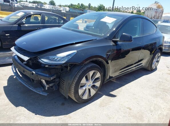 7SAYGAEE2NF486704 2022 TESLA MODEL Y Black Front left