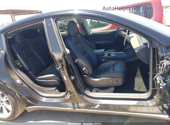 7SAYGAEE2NF486704 2022 TESLA MODEL Y Black 360 interior view