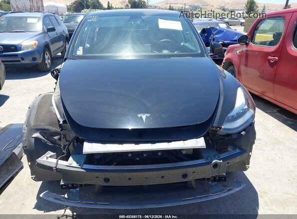 7SAYGAEE2NF486704 2022 TESLA MODEL Y Black Rear interior view