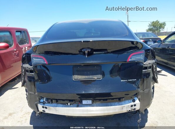 7SAYGAEE2NF486704 2022 TESLA MODEL Y Black 