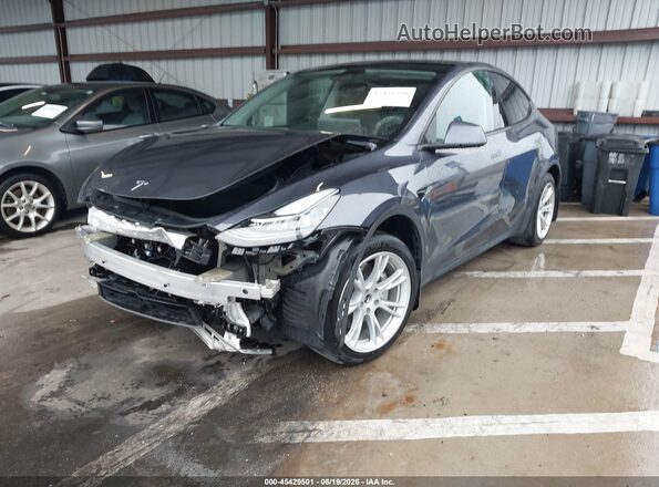 7SAYGAEE2PF613292 2023 TESLA MODEL Y Blue Առջևի ձախ երեք քառորդ տեսարան