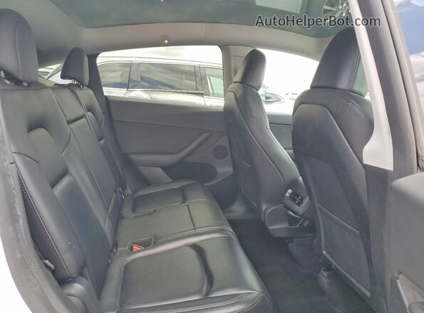 7SAYGAEE2PF792918 2023 TESLA MODEL White Rear seats view