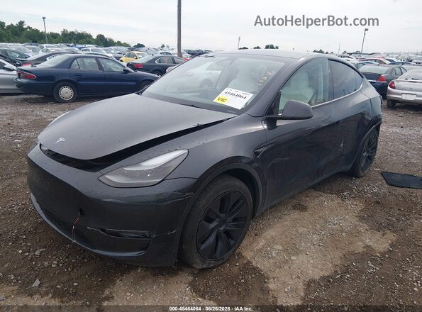 7SAYGAEE2SF288796 2025 TESLA MODEL Y Black წინა მარცხენა ხედი სამი მეოთხედიდან