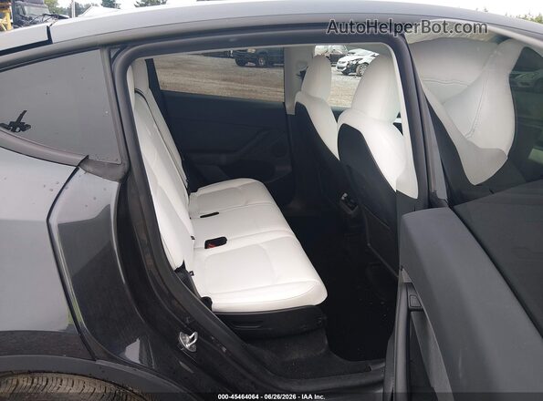 7SAYGAEE2SF288796 2025 TESLA MODEL Y Black VIN კოდის სტიკერის ხედი