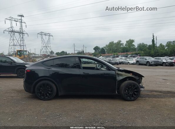 7SAYGAEE3NF314147 2022 TESLA MODEL Y Black Вид задньої частини салону