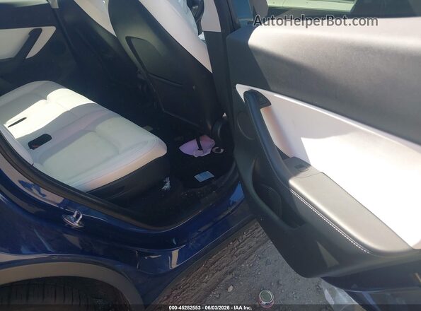 7SAYGAEE4NF314416 2022 TESLA MODEL Y Blue Vista de la etiqueta del VIN