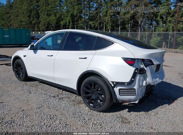 7SAYGAEE5PF806780 2023 TESLA MODEL Y White Rear left