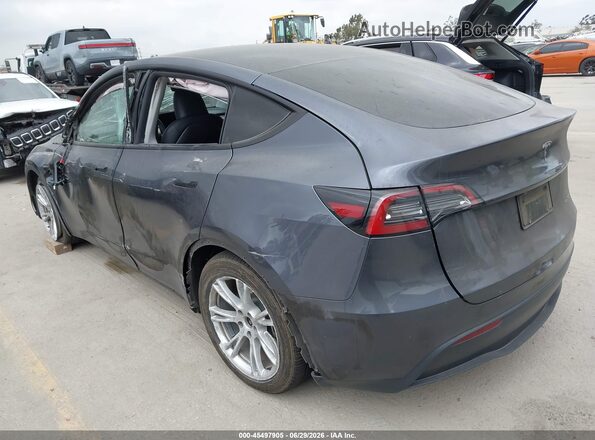 7SAYGAEE5PF909942 2023 TESLA MODEL Y Gray Trasero izquierdo