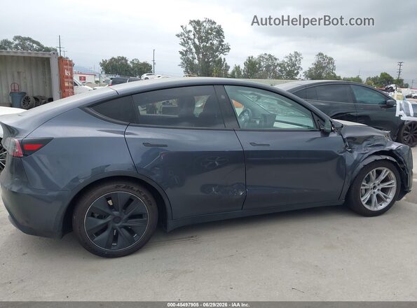 7SAYGAEE5PF909942 2023 TESLA MODEL Y Gray Vista interior de 360 grados