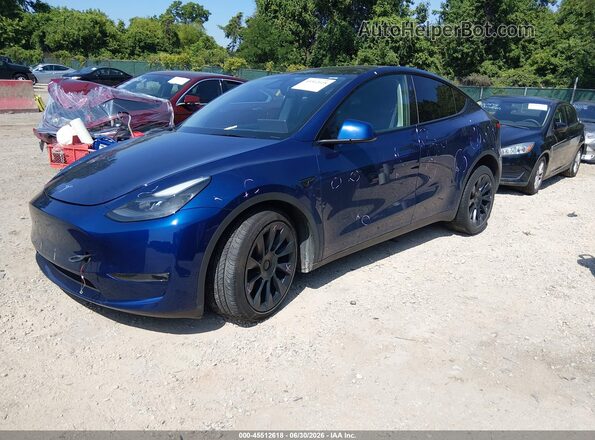 7SAYGAEE7RF063560 2024 TESLA MODEL Y Blue Առջևի ձախ երեք քառորդ տեսարան