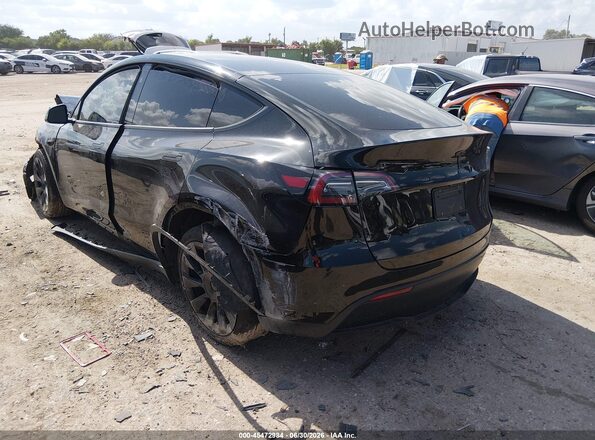 7SAYGAEE7RF092041 2024 TESLA MODEL Y Black Rear left