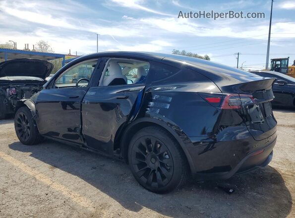7SAYGAEE7SF239402 2025 TESLA MODEL Black Trasero izquierdo