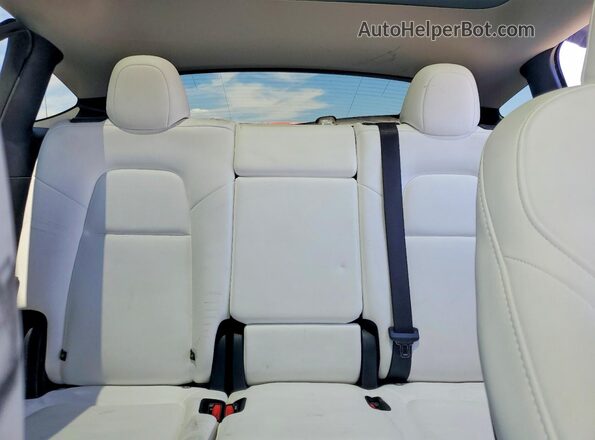 7SAYGAEE7SF239402 2025 TESLA MODEL Black Vista de los asientos traseros