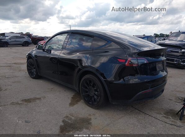 7SAYGAEE8NF365837 2022 TESLA MODEL Y Black Tył lewy