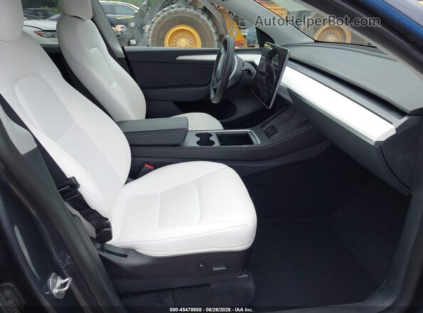 7SAYGAEE8PF583750 2023 TESLA MODEL Y Navy Вид салона спереди