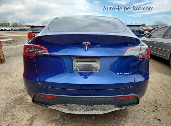 7SAYGAEE8RF009667 2024 TESLA MODEL Blue Widok z tyłu