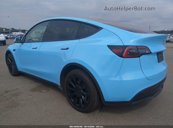7SAYGAEE9PF645026 2023 TESLA MODEL Y Blue Rear left