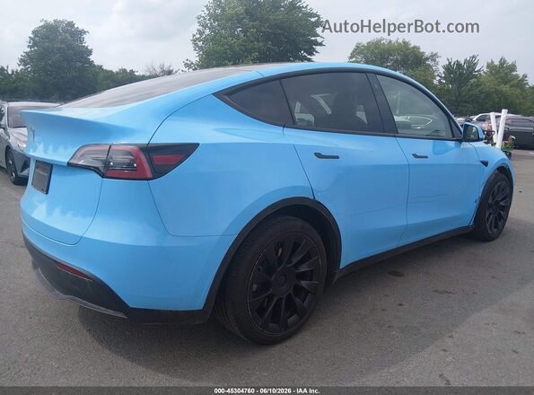 7SAYGAEE9PF645026 2023 TESLA MODEL Y Blue Rear right
