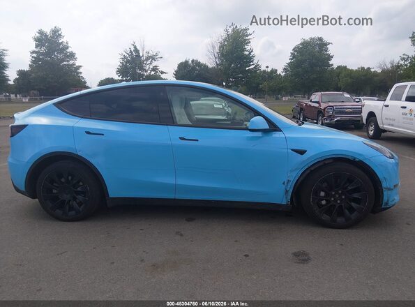 7SAYGAEE9PF645026 2023 TESLA MODEL Y Blue Rear interior view