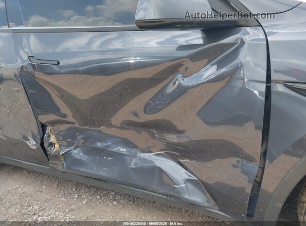 7SAYGAEE9PF902802 2023 TESLA MODEL Y Gray Vista del salpicadero