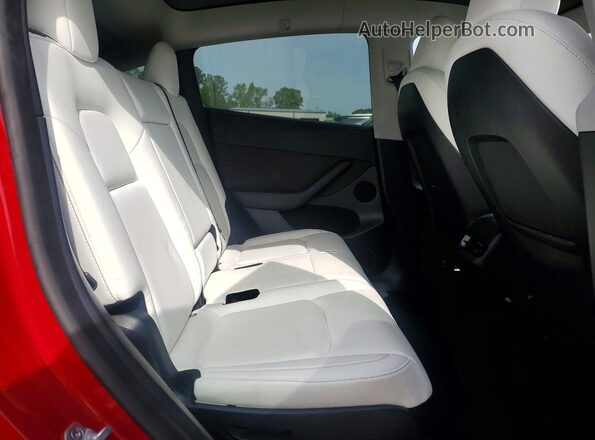 7SAYGAEE9PF964913 2023 TESLA MODEL Red Rear interior view