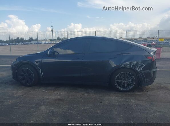 7SAYGAEE9SF221936 2025 TESLA MODEL Y Серый Вид щитка приборов