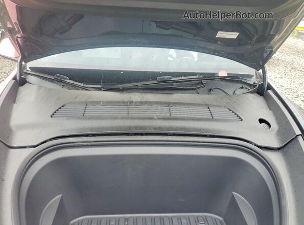 7SAYGAEEXRF020105 2024 TESLA MODEL Two Tone Rear interior view