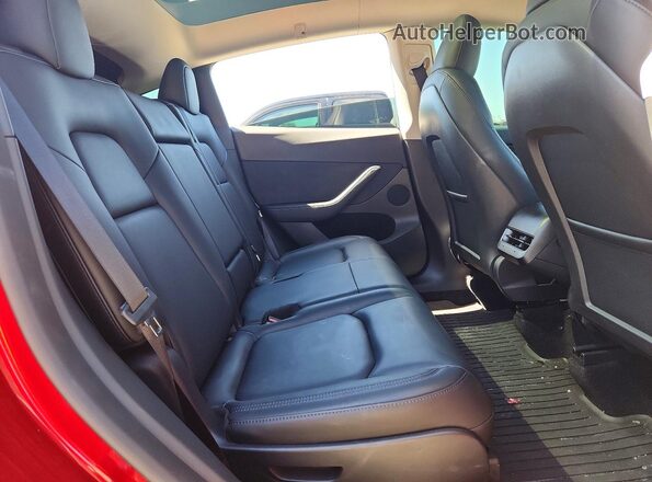 7SAYGAEEXRF181277 2024 TESLA MODEL Red Rear seats view