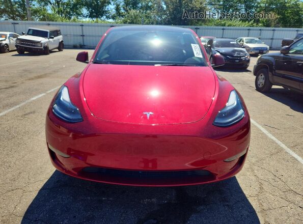 7SAYGAEEXRF181277 2024 TESLA MODEL Red Front view