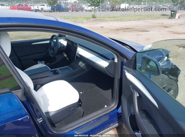 7SAYGAEEXRF206209 2024 TESLA MODEL Y Blue წინა სალონის ხედი