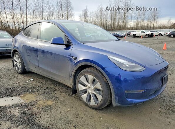 7SAYGAEEXRF982646 2024 TESLA MODEL Blue Przód prawy