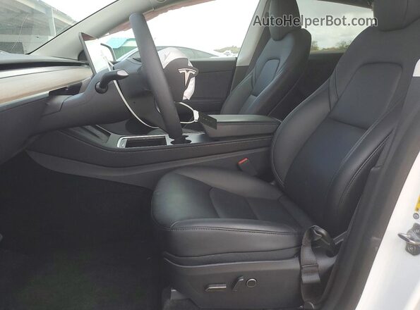 7SAYGAEEXSF249440 2025 TESLA MODEL Белый Вид салона спереди
