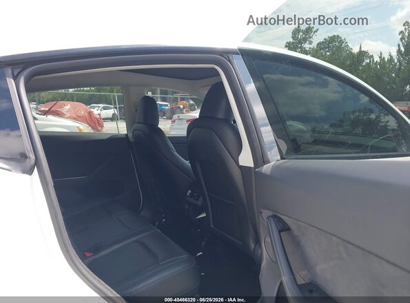 7SAYGDED0RA328180 2024 TESLA MODEL Y Белый Вид наклейки с VIN-кодом