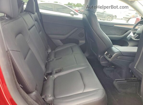 7SAYGDED0RF133442 2024 TESLA MODEL Red Vista de los asientos traseros
