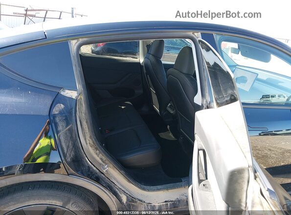 7SAYGDED0SF242831 2025 TESLA MODEL Y Black VIN կոդի պիտակի տեսք