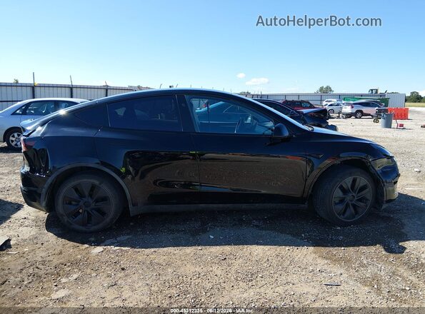 7SAYGDED0SF242831 2025 TESLA MODEL Y Black Սալոնի հետևի տեսք