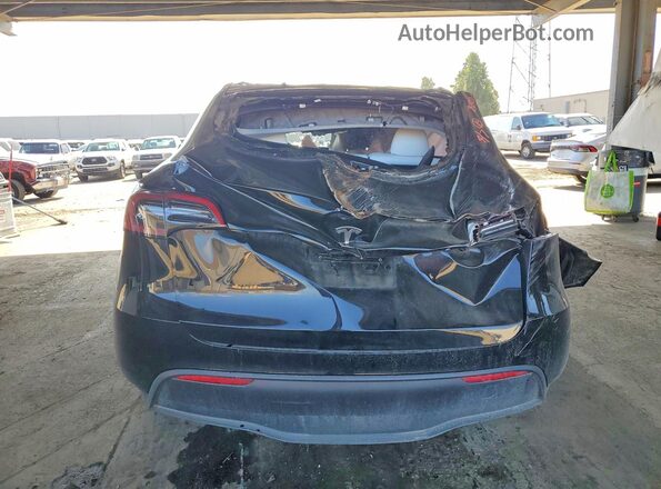 7SAYGDED0SF320234 2025 TESLA MODEL Черный Вид сзади