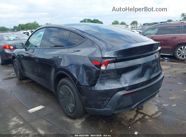 7SAYGDED0TA593866 2026 TESLA MODEL Y Gray Սալոնի հետևի տեսք
