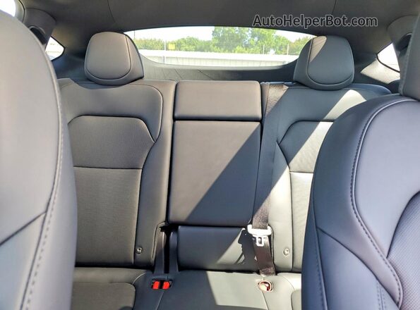 7SAYGDED0TA681168 2026 TESLA MODEL Charcoal Vista de los asientos traseros