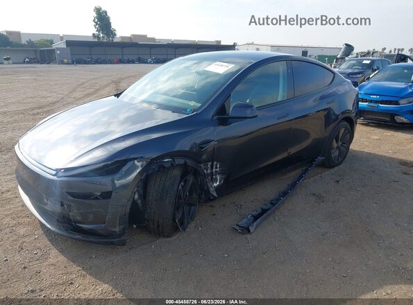 7SAYGDED0TF461032 2026 TESLA MODEL Y Gray Առջևի ձախ երեք քառորդ տեսարան