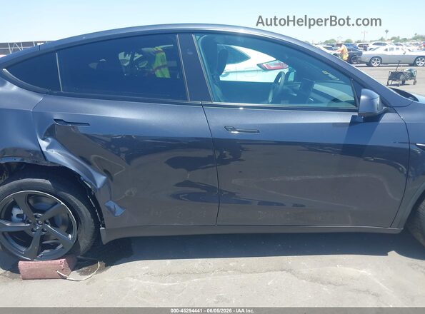 7SAYGDED0TF638288 2026 TESLA MODEL Y Gray Вид задньої частини салону