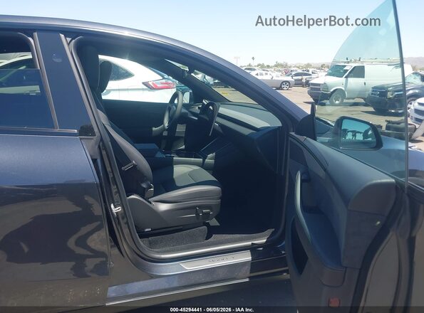 7SAYGDED0TF638288 2026 TESLA MODEL Y Gray Вид салону спереду