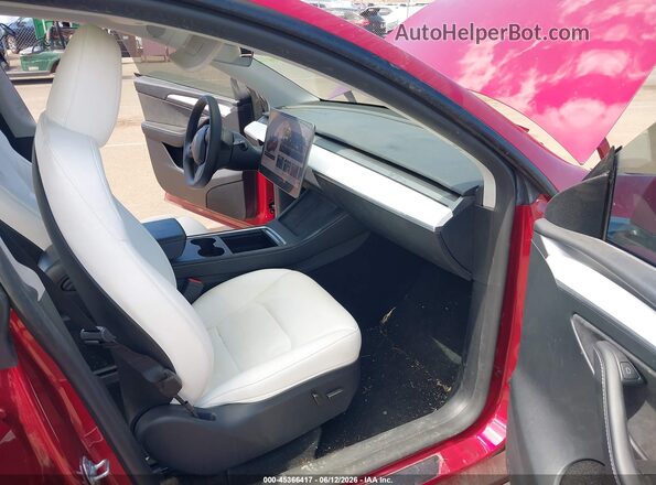 7SAYGDED1RF131005 2024 TESLA MODEL Y Красный Вид салона спереди