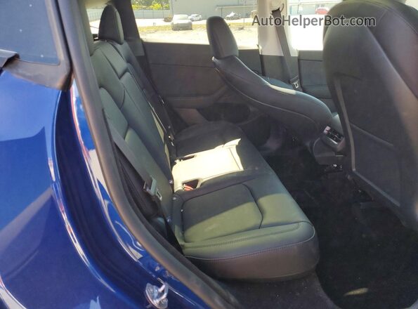 7SAYGDED1SF273957 2025 TESLA MODEL Blue უკანა სავარძლების ხედი