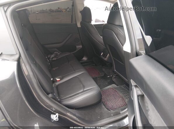 7SAYGDED1SF311476 2025 TESLA MODEL Y Black VIN კოდის სტიკერის ხედი