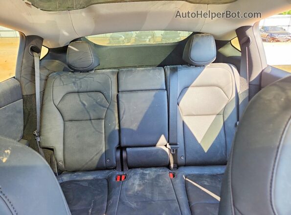 7SAYGDED1TA431518 2026 TESLA MODEL White Vista de los asientos traseros