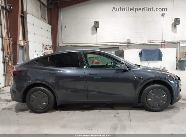 7SAYGDED1TA706496 2026 TESLA MODEL Y Navy Vista interior trasera