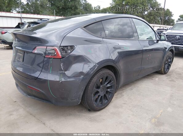 7SAYGDED2PF941823 2023 TESLA MODEL Y Gray Trasero derecho