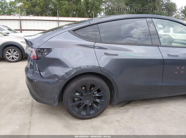 7SAYGDED2PF941823 2023 TESLA MODEL Y Gray Vista frontal